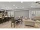 Bright living space with a view of the backyard, combining kitchen, dining, and living areas at 2804 Candelaria Dr, Henderson, NV 89074