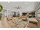 Spacious open-concept living room connecting to the kitchen and game room, perfect for entertaining at 2804 Candelaria Dr, Henderson, NV 89074