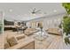 Elegant living room seamlessly connecting to the kitchen and featuring modern furnishings at 2804 Candelaria Dr, Henderson, NV 89074