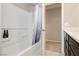 Bright bathroom features a shower and bathtub combo with black vanity at 2871 Cabrillo Terrace St, Henderson, NV 89044