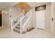 Welcoming entryway with neutral paint and tile floor leads to the staircase at 2871 Cabrillo Terrace St, Henderson, NV 89044