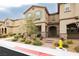 Inviting home exterior with manicured landscaping and a stone-accented entryway at 2871 Cabrillo Terrace St, Henderson, NV 89044