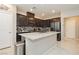 Modern kitchen featuring granite countertops and stainless steel appliances at 2871 Cabrillo Terrace St, Henderson, NV 89044