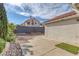Backyard with a mix of hardscape and gravel landscaping for low maintenance at 301 Montcliff Ave, Henderson, NV 89074