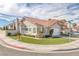 Attractive single-story home with a two-car garage, tile roof and artificial front lawn at 301 Montcliff Ave, Henderson, NV 89074