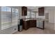 Modern kitchen featuring granite countertops and stainless steel appliances at 301 Montcliff Ave, Henderson, NV 89074