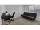 Cozy office space with a modern desk, chair, and sofa for versatile use at 301 Montcliff Ave, Henderson, NV 89074