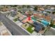 An aerial view of a single story home with a private pool in a neighborhood near Las Vegas at 325 Greenfield Ln, Las Vegas, NV 89107