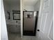 Updated bathroom featuring gray vanity and modern shower with glass doors at 325 Greenfield Ln, Las Vegas, NV 89107