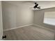 Bedroom with a ceiling fan and gray floors at 325 Greenfield Ln, Las Vegas, NV 89107