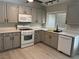 Well-lit kitchen with lots of counter space, modern appliances, and a large sink at 325 Greenfield Ln, Las Vegas, NV 89107