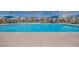 Relaxing community pool with lounge seating and shallow area for children and families at 3264 Monte Luna Ave, Henderson, NV 89044