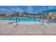 Enjoy the community pool with easy access stairs and plenty of lounge seating for sunny days at 3264 Monte Luna Ave, Henderson, NV 89044