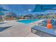 Stunning community pool area with shaded loungers and pergola-covered seating, perfect for socializing at 3264 Monte Luna Ave, Henderson, NV 89044