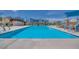 A refreshing community swimming pool with lounge chairs and a clear 'no diving' zone at 3264 Monte Luna Ave, Henderson, NV 89044