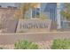 Community entrance sign with stone base, landscaping, and neighborhood name 'Highview' in metal lettering at 3264 Monte Luna Ave, Henderson, NV 89044