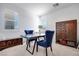Home office space with table, accent chairs, and storage cabinet at 3264 Monte Luna Ave, Henderson, NV 89044