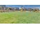 Community playground offers green space with play structures, shaded seating, and picnic area at 3264 Monte Luna Ave, Henderson, NV 89044