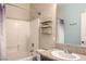 Bathroom featuring a shower and tub combo, vanity, and neutral colored walls at 3700 Hedge Grove Dr, North Las Vegas, NV 89032