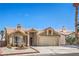Charming single-story home with a well-maintained lawn and desert landscaping in a sunny neighborhood at 3700 Hedge Grove Dr, North Las Vegas, NV 89032