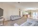 View of an open floor plan, showing the living room flowing into the kitchen area at 3700 Hedge Grove Dr, North Las Vegas, NV 89032