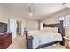 Main bedroom showcasing neutral walls, carpet flooring, and dark wood furniture at 3700 Hedge Grove Dr, North Las Vegas, NV 89032