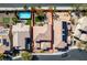 Aerial view of the property highlighting the backyard pool, patio, and surrounding landscaping at 3829 Hawkeye Falls Ave, North Las Vegas, NV 89085