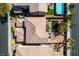 An aerial view shows the roof, backyard, patio and landscaping of this well-maintained home at 3829 Hawkeye Falls Ave, North Las Vegas, NV 89085
