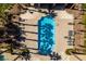 Overhead shot of community pool featuring lounge chairs and palm tree landscaping at 3829 Hawkeye Falls Ave, North Las Vegas, NV 89085