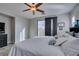 Inviting bedroom with sliding glass door access to a deck, offering an open and airy feel at 3829 Hawkeye Falls Ave, North Las Vegas, NV 89085
