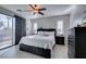 Bright bedroom with a sliding glass door to a deck and neutral tones at 3829 Hawkeye Falls Ave, North Las Vegas, NV 89085