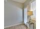 Cozy bedroom with a door leading to the outside and featuring window shutters at 3829 Hawkeye Falls Ave, North Las Vegas, NV 89085