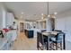 Expansive open kitchen and dining area, with modern cabinets, sleek appliances, and an abundance of natural light at 3829 Hawkeye Falls Ave, North Las Vegas, NV 89085