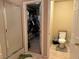 Bathroom featuring toilet, tiled floors and glass shower at 3844 Hollycroft Dr, North Las Vegas, NV 89081