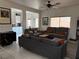 Open living room with neutral paint, tiled floors and plenty of natural light at 3844 Hollycroft Dr, North Las Vegas, NV 89081
