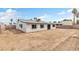 Wide shot of the home's backyard with clear lot lines and landscaping opportunities at 3911 Chutney St, Las Vegas, NV 89121