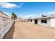 Large, fenced backyard offering privacy and potential for landscaping or outdoor activities at 3911 Chutney St, Las Vegas, NV 89121