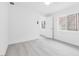 Cozy bedroom with light-filled windows and sleek floors at 3911 Chutney St, Las Vegas, NV 89121