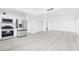 Open-concept living area featuring sleek flooring and ample natural light at 3911 Chutney St, Las Vegas, NV 89121