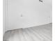 Bright wall with sleek floors and doorways leading to the bathroom at 3911 Chutney St, Las Vegas, NV 89121