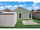 The backyard offers a shed for storage and ample space for recreation at 4156 Broadriver Dr, Las Vegas, NV 89108