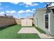 The backyard offers a shed for storage and ample space for recreation at 4156 Broadriver Dr, Las Vegas, NV 89108