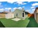 The backyard offers a shed for storage and ample space for recreation at 4156 Broadriver Dr, Las Vegas, NV 89108