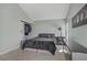 Bedroom with light blue walls, a sliding door closet, and tile flooring at 4156 Broadriver Dr, Las Vegas, NV 89108