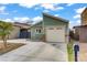 Charming single-story home featuring an attached garage, bay window, and desert landscaping at 4156 Broadriver Dr, Las Vegas, NV 89108