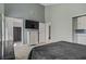 This main bedroom features tile floors, ensuite bath, television, and a neutral color palette at 4156 Broadriver Dr, Las Vegas, NV 89108