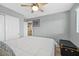 Bedroom featuring a ceiling fan, closet, and a cozy bed at 4224 Galapagos Ave, North Las Vegas, NV 89084