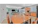 Inviting kitchen area with seamless transition to the dining area and a cozy living room at 4224 Galapagos Ave, North Las Vegas, NV 89084