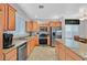 Well-equipped kitchen featuring stainless steel appliances, ample cabinet space, and granite countertops at 4224 Galapagos Ave, North Las Vegas, NV 89084