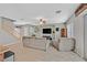 Bright, open-concept living room with tile floors, comfortable furniture, and lots of space at 4224 Galapagos Ave, North Las Vegas, NV 89084